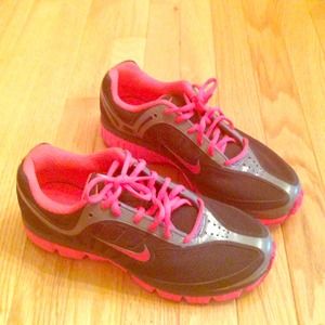 Hot pink and black Nike shoes