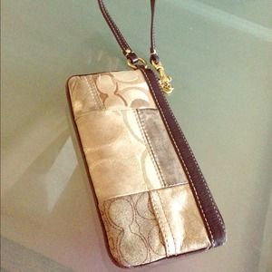 SOLD...Coach Wristlet leather and suede
