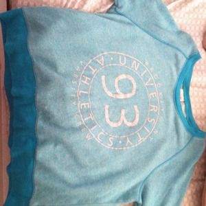 Light blue long sleeved sweatshirt