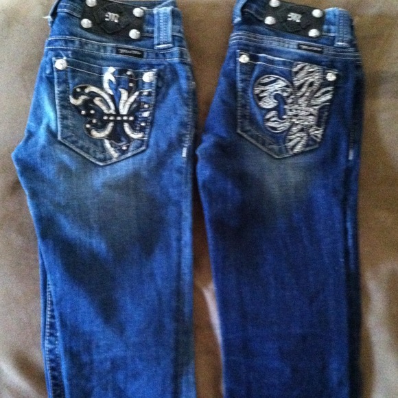 Two pairs of size 25 Miss Me- great condition