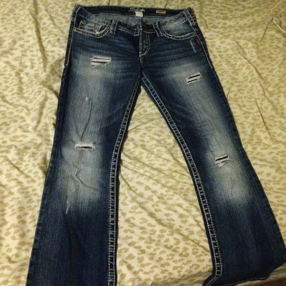 Silver jeans with fashion tears in front