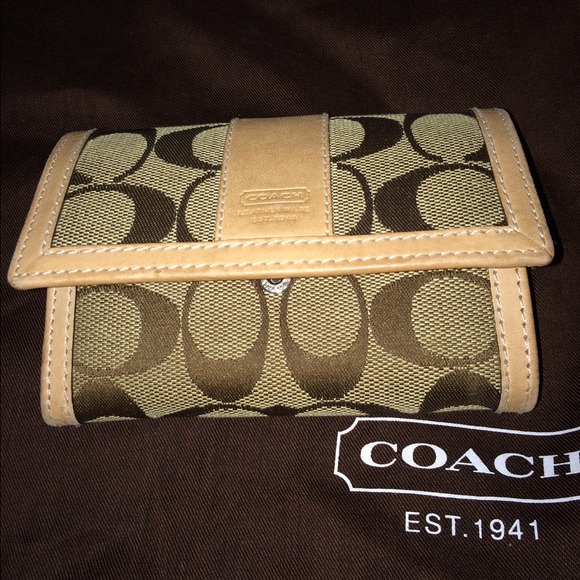 Coach Handbags - Authentic brown signature leather trim wallets...