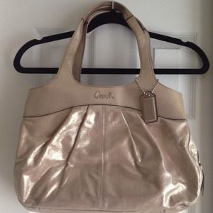 Gold Coach Bag.