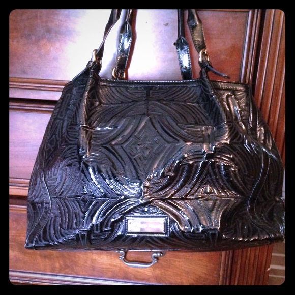 Black leather shoulder purse.