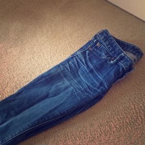 Distressed blue jeans