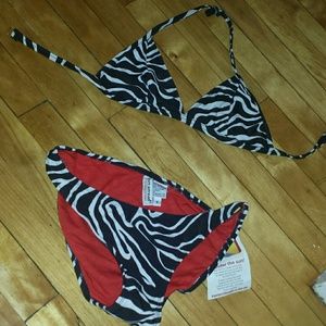 New W tags. Black and white Baithing suit