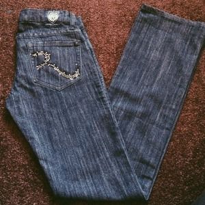 Dark blue Rock & Republic boot cut jeans.