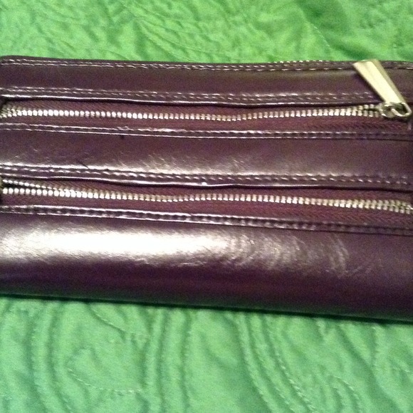 Dark plum wallet with compartments. Like new!