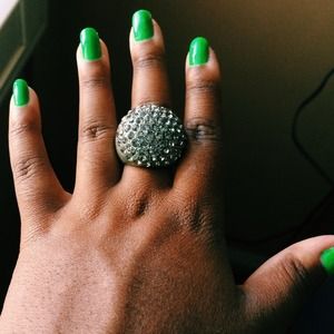 Oversized clustered ring.