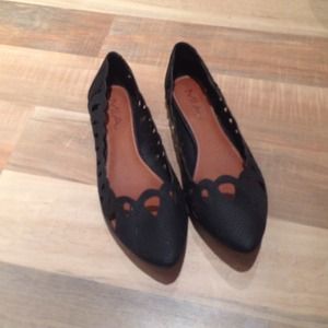 Black flats with cutouts