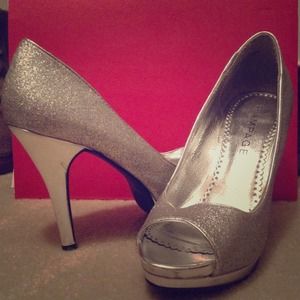 Silver sparkly high heels. Size 7.1/2.