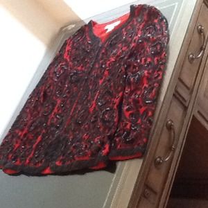 Heavy black paisley sequins on red silk jacket