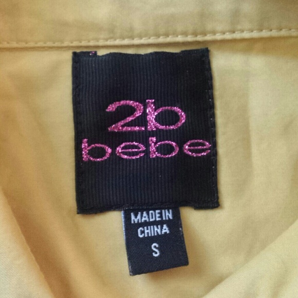 Small yellow BEBE button down shirt