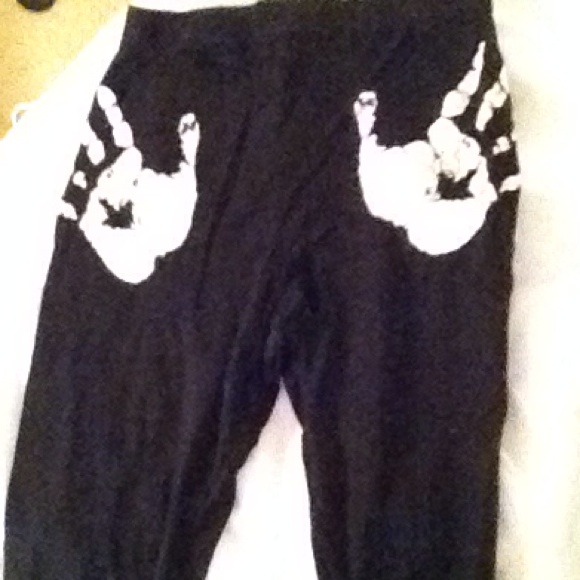 Black leggings with handprints on butt