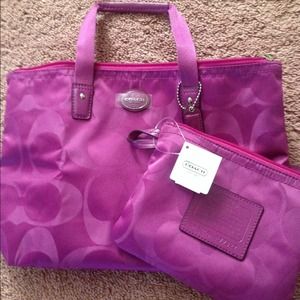 100% authentic Coach getaway bag in fuchsia bundle