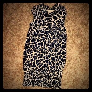 Sleeveless, ruffled blouse