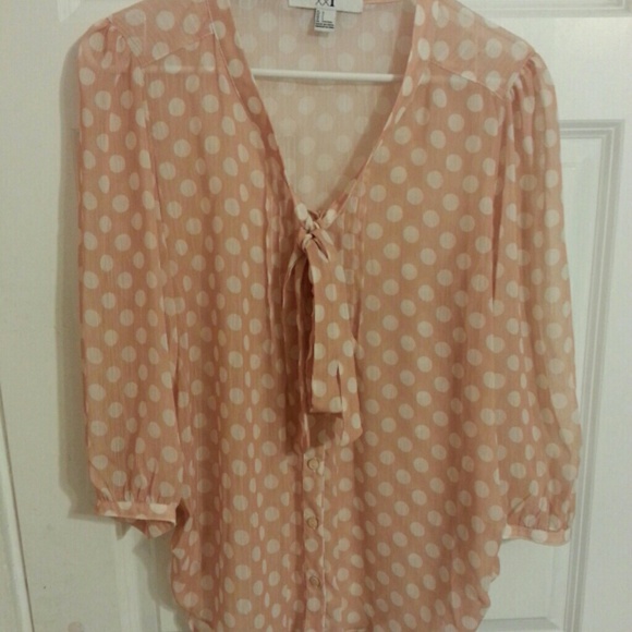 Tan button down blouse with polka dots and bow.