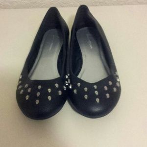 Black flats with skull detailing