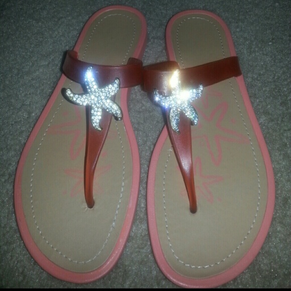 Orange jelly flip flops size 9