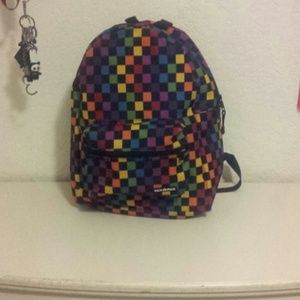 Neon rainbow checkerboard backpack.