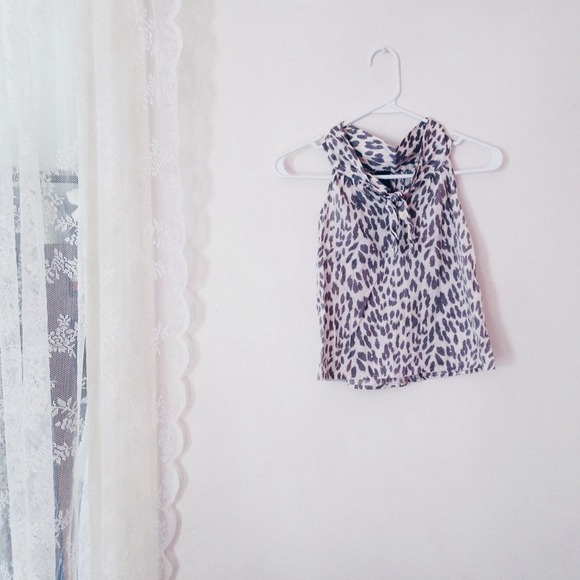 White and grey animal print blouse.