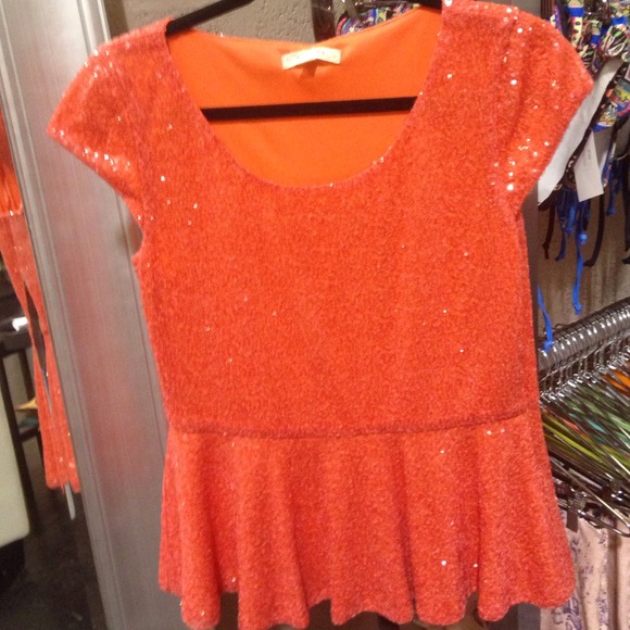 Cute sequin peplum shirt