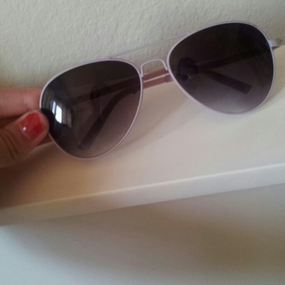 Purple sunglasses.