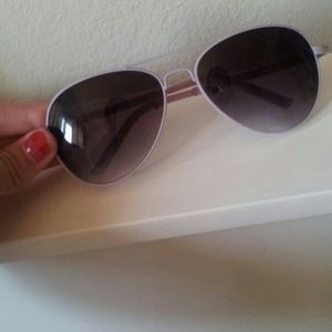 Purple sunglasses.