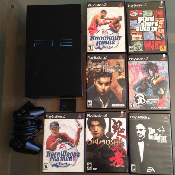 Sold Playstation 2 console, controller, 7 games