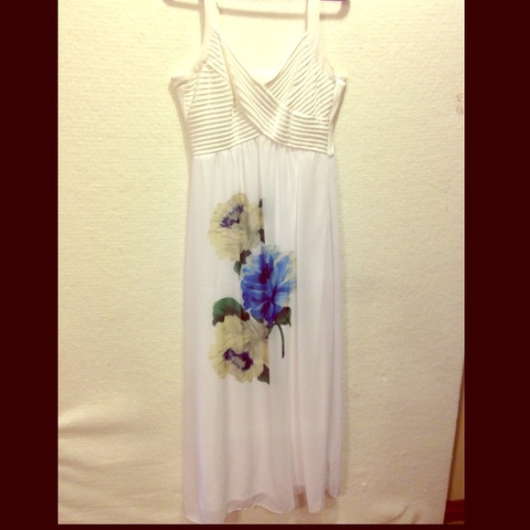 White dress with flowers.