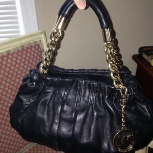 Michael Kors black "evening bag."