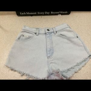 Light denim high waist shorts .
