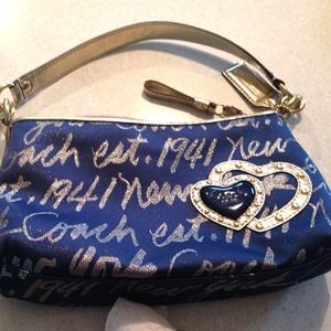 Small coach purse.