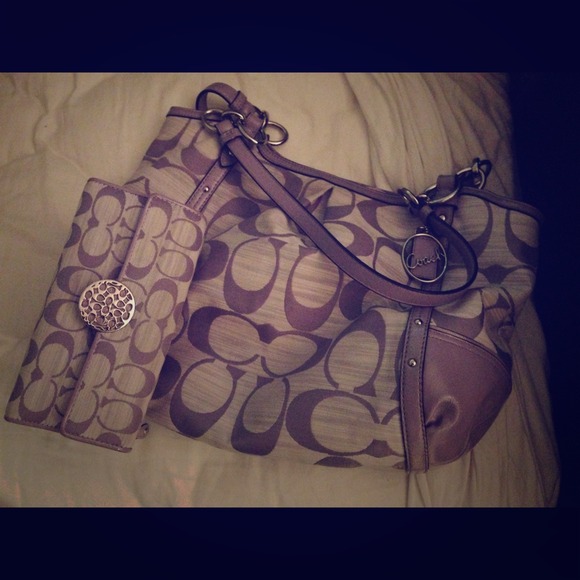 Purple coach purse and matching wallet.