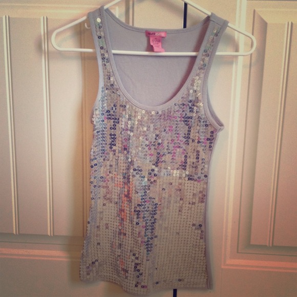 Gray sequin shirt.