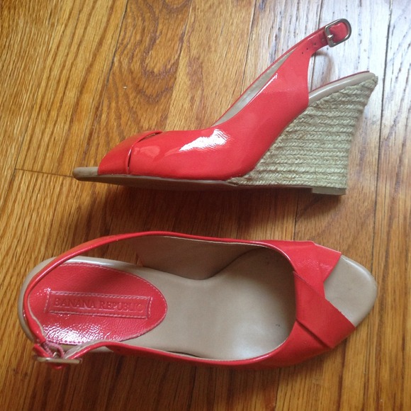 Bright coral patent leather wedges