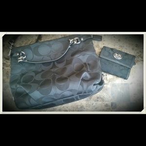 Black coach purse with wallet.
