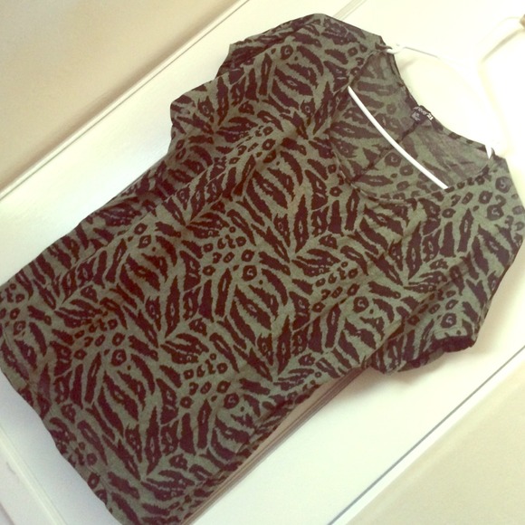 Donating Friday Green safari print shirt