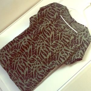 Donating Friday Green safari print shirt