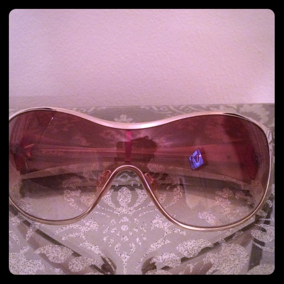 Oakley Accessories - Oakley Gold sunglasses. Barley worn.