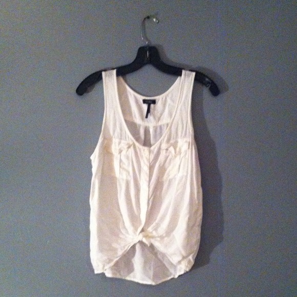 White button-down top. Tied the bottom w/ pockets.