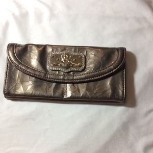 Kathy Van Zeeland metallic clutch