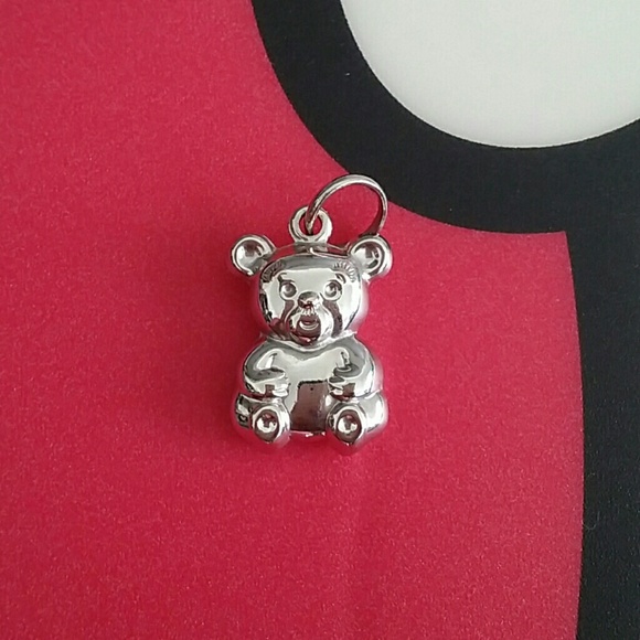 Bundled ** 14 kt white gold bear pendant