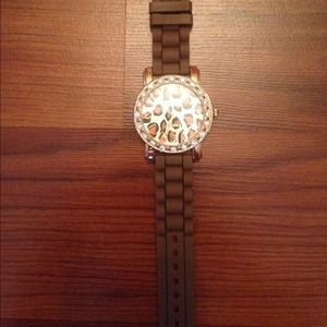 Brown watch with cheetah face