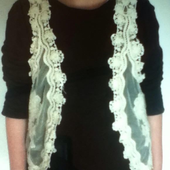 Creme Vest with a Flower