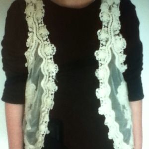 Creme Vest with a Flower