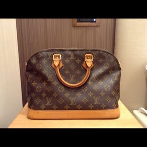 Louis Vuitton alma with lock key and dustbag