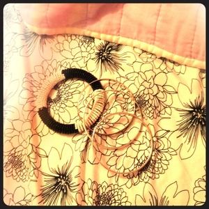 Black and white bangles. Four total.