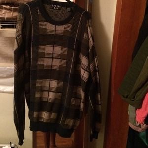 Very big bill Cosby like sweater.