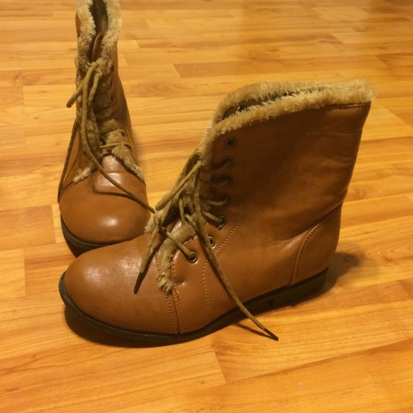 Tan combat boots with fur